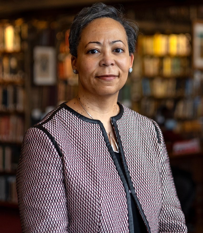 Image of Elain Westbrooks, smiling, in a library